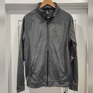 Men's Jordan Brand zip up with hideaway nylon hood.